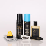 Collection of leather grooming products including bottles, a brush, and a cloth on a white background