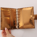 Gucci Metallic Bronze Monogram Agenda Cover