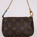 Limited Edition Louis Vuitton 2019 Christmas Vivienne Mini Monogram Pochette