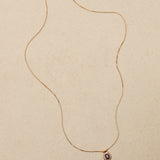 1990's 18K Yellow Gold Oval Cut Sapphire and Diamond Pendant Necklace