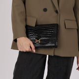 Hermès 1973 Noir Porosus Crocodile Annie Clutch GHW