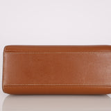 Hermès 1987 Gold Courchevel Kelly Sport 20 GHW