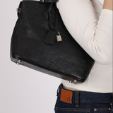 Louis Vuitton Monogram Leather Revelation Lockit MM