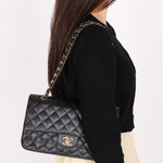 Chanel Medium Classic Double Flap Black Caviar 24K GP