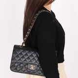 Chanel Medium Classic Double Flap Black Caviar 24K GP