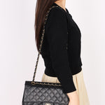 Chanel Medium Classic Double Flap Black Caviar 24K GP