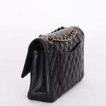 Chanel Medium Classic Double Flap Black Caviar 24K GP