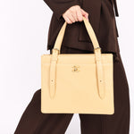 Chanel Front Pocket Buckle Strap Tote Beige Caviar GHW