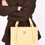 Chanel Front Pocket Buckle Strap Tote Beige Caviar GHW