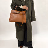 Limited Edition Hermès 2012 Fauve Tadelakt Ghillies Kelly Retourne 35 GHW