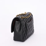 Chanel Medium Classic Double Flap Black Caviar 24K GP