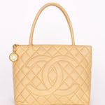Chanel Caviar Beige Medallion Charm Tote Bag