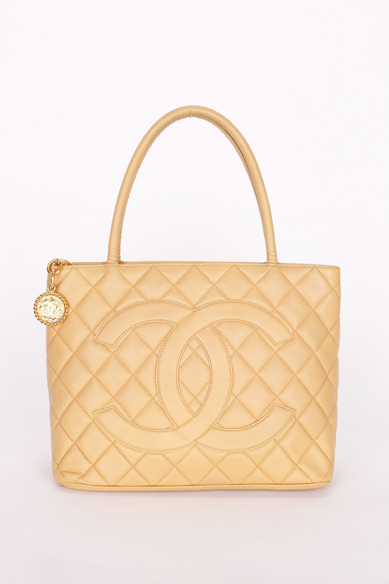Chanel Caviar Beige Medallion Charm Tote Bag