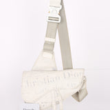 Christian Dior X Daniel Arsham Newspaper Print Saddle Crossbody Bag