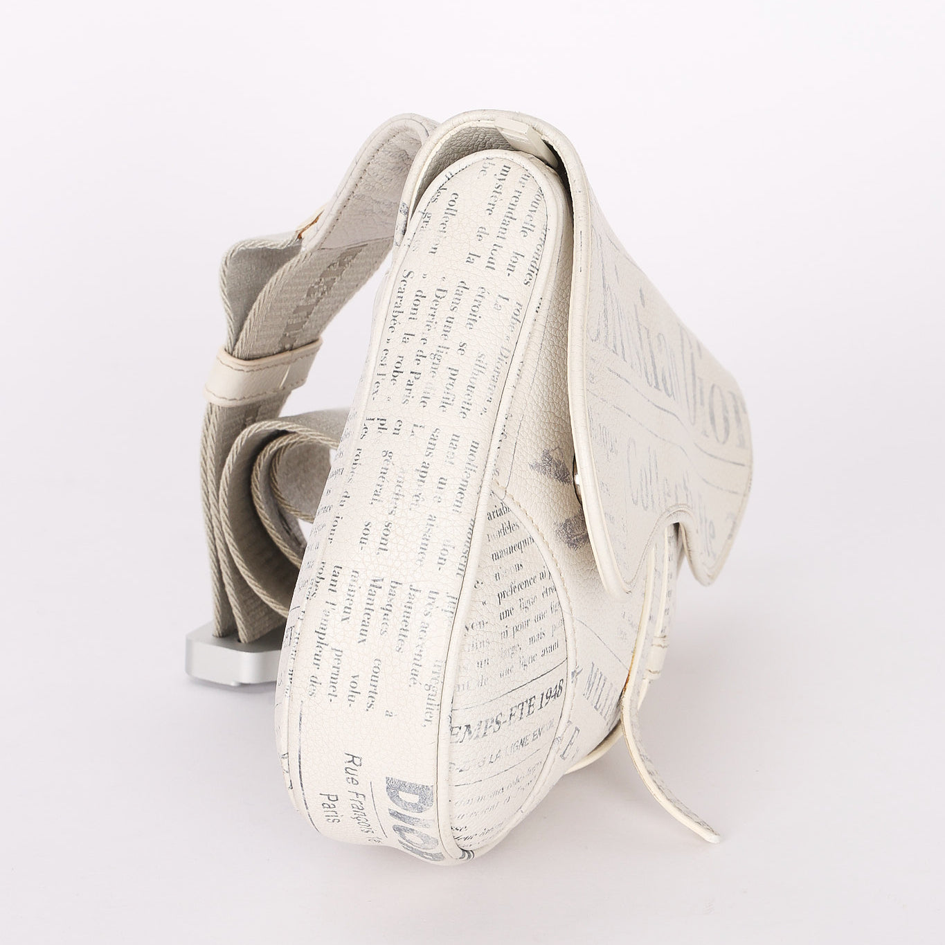Christian Dior X Daniel Arsham Newspaper Print Saddle Crossbody Bag