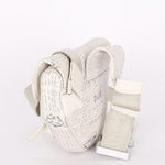 Christian Dior X Daniel Arsham Newspaper Print Saddle Crossbody Bag