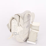 Christian Dior X Daniel Arsham Newspaper Print Saddle Crossbody Bag