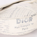 Christian Dior X Daniel Arsham Newspaper Print Saddle Crossbody Bag