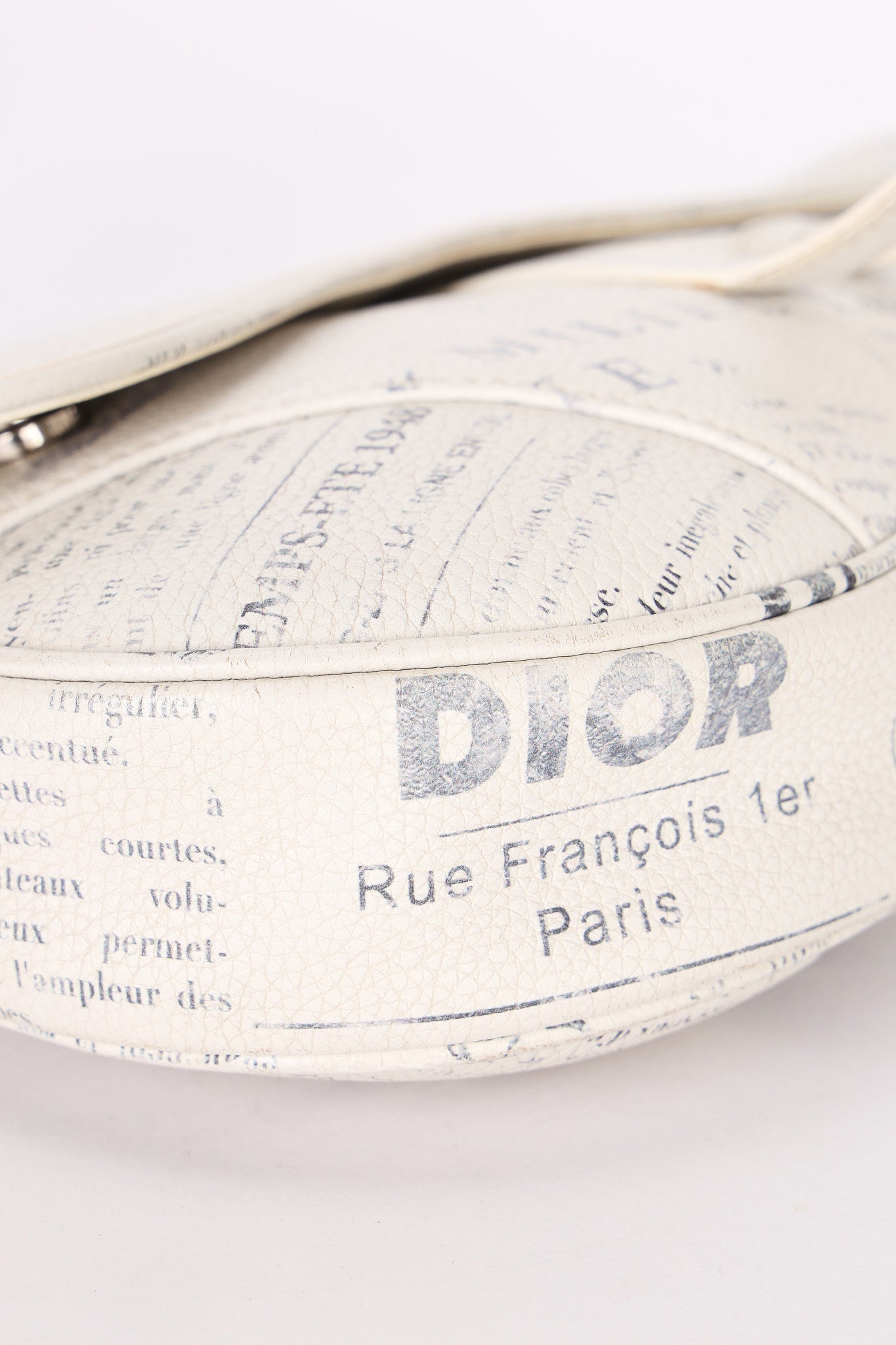 Christian Dior X Daniel Arsham Newspaper Print Saddle Crossbody Bag