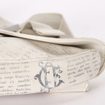 Christian Dior X Daniel Arsham Newspaper Print Saddle Crossbody Bag