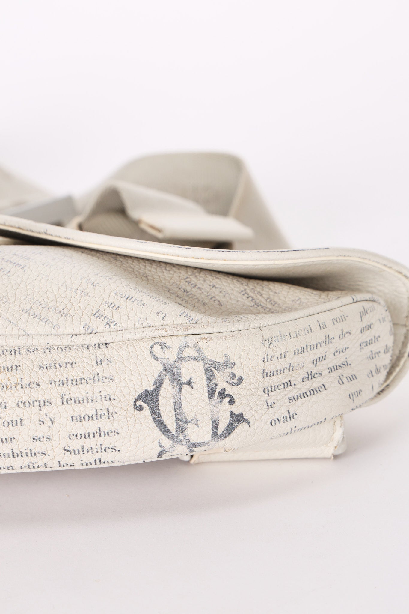 Christian Dior X Daniel Arsham Newspaper Print Saddle Crossbody Bag