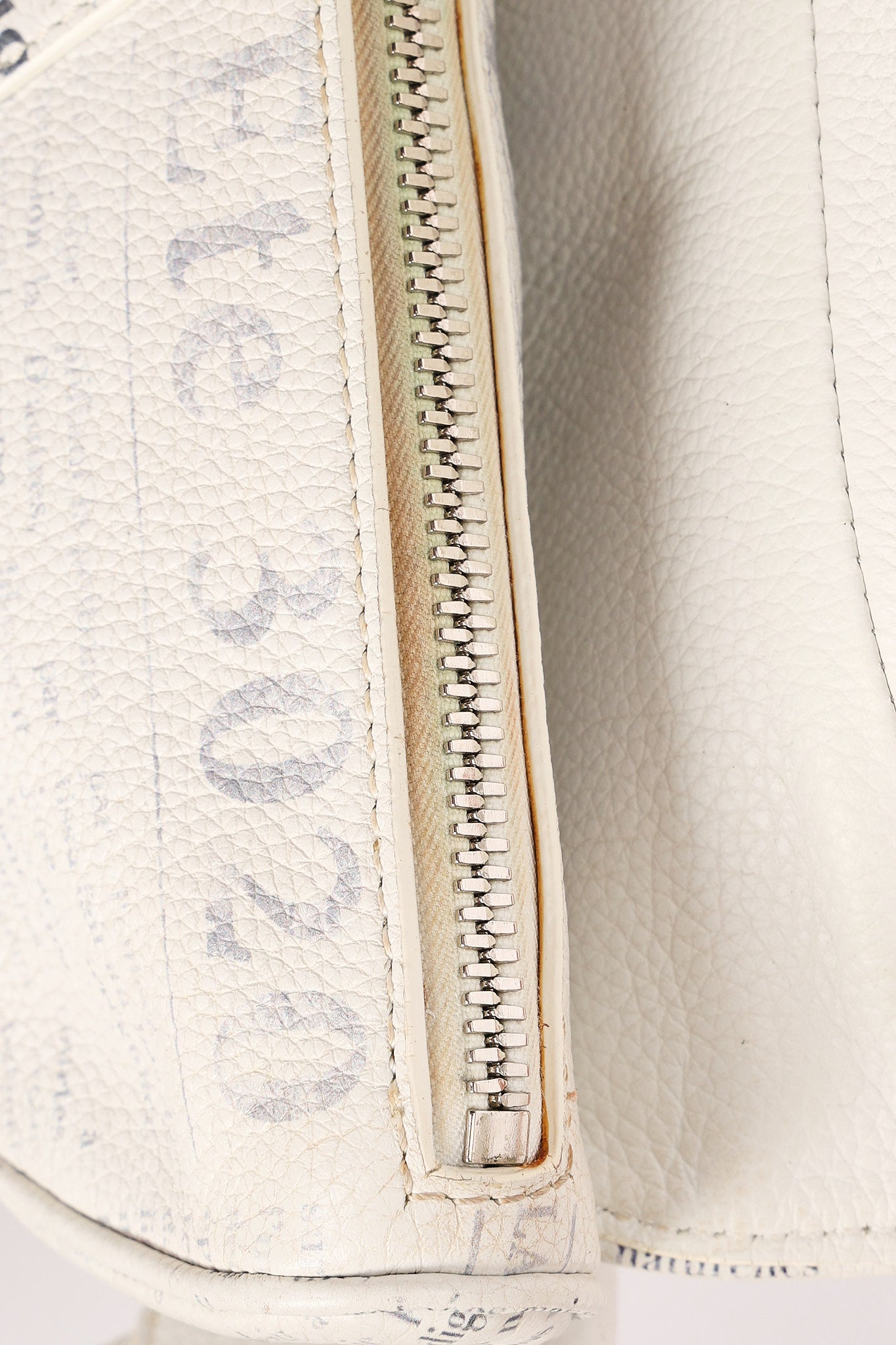Christian Dior X Daniel Arsham Newspaper Print Saddle Crossbody Bag