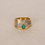Vintage 18K Yellow Gold Oval Cut Emerald and Pavé Diamond Bypass Ring