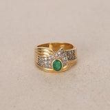 Vintage 18K Yellow Gold Oval Cut Emerald and Pavé Diamond Bypass Ring