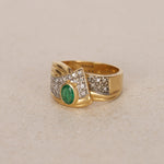 Vintage 18K Yellow Gold Oval Cut Emerald and Pavé Diamond Bypass Ring
