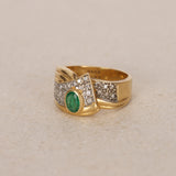 Vintage 18K Yellow Gold Oval Cut Emerald and Pavé Diamond Bypass Ring
