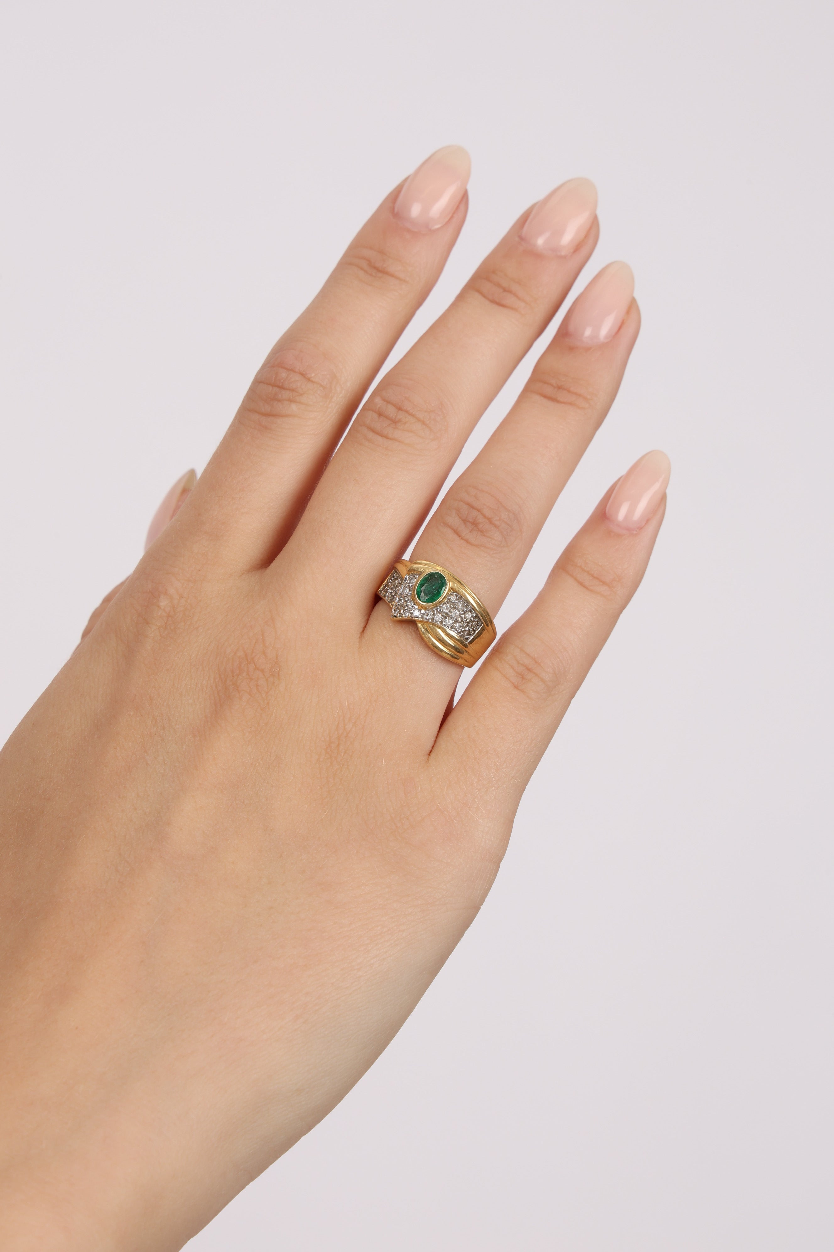 Vintage 18K Yellow Gold Oval Cut Emerald and Pavé Diamond Bypass Ring