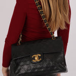 Chanel XL Logo Jumbo Single Flap Black Lambskin 24K GP