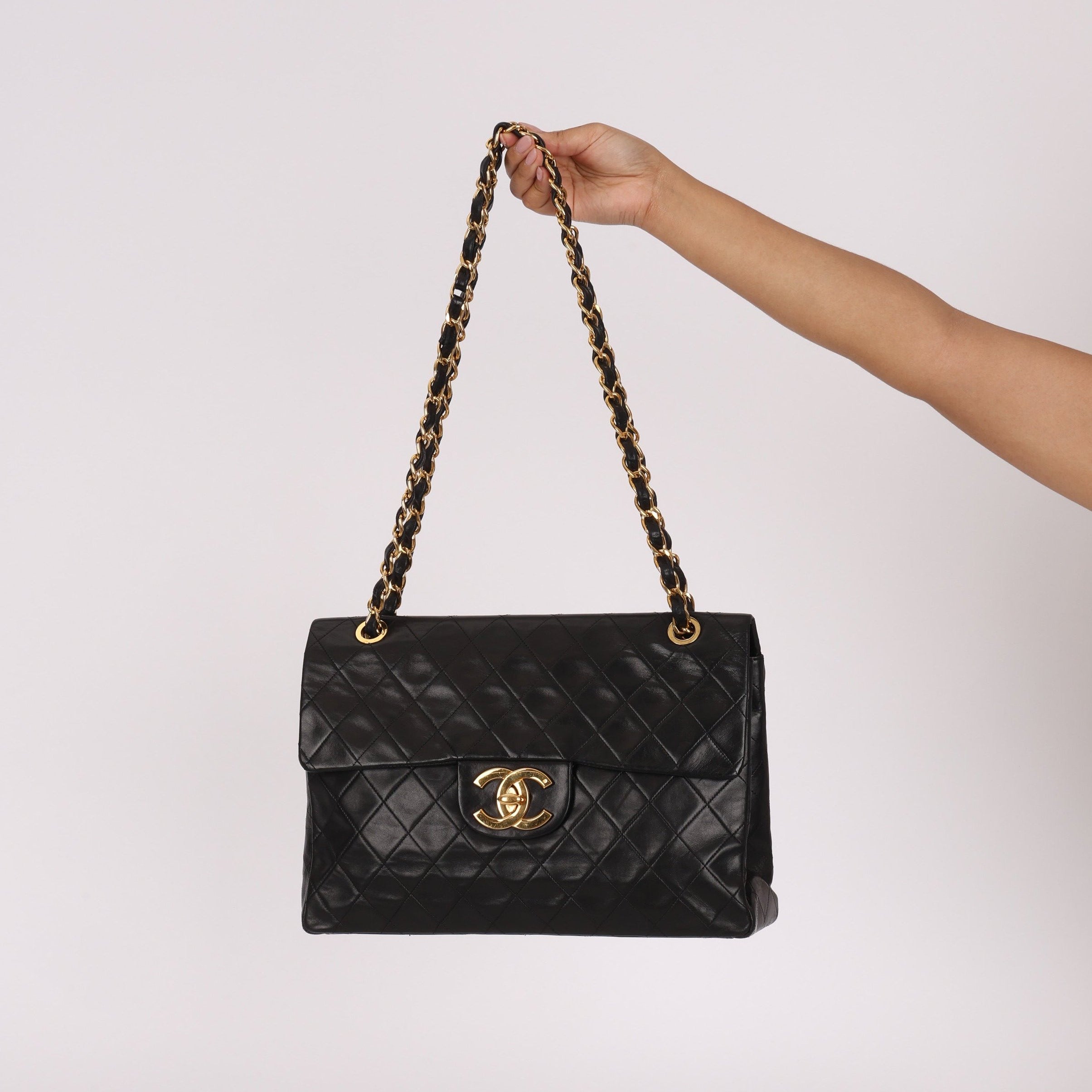 Chanel XL Logo Jumbo Single Flap Black Lambskin 24K GP – FashioNica