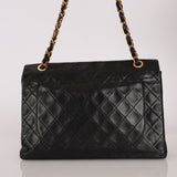 Chanel XL Logo Jumbo Single Flap Black Lambskin 24K GP
