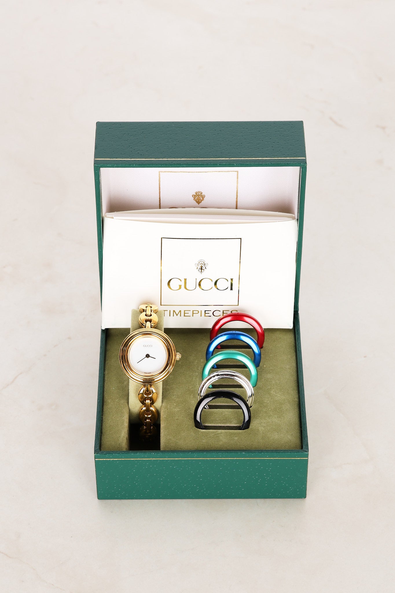 Gucci Multicolor Bezel Gold Watch