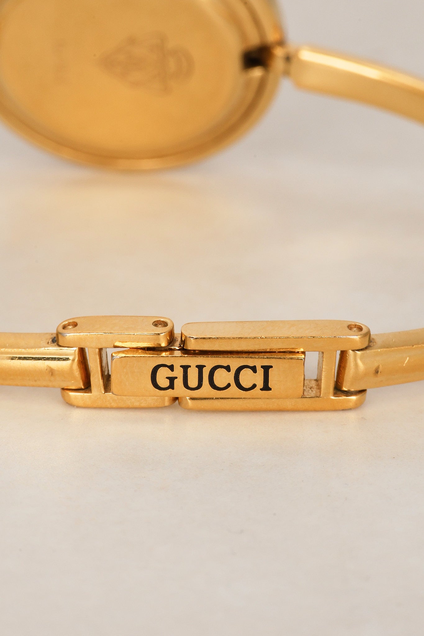 Gucci Gold Change Bezel Watch