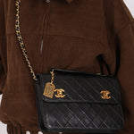 Chanel Double Turnlock Top Handle Bag Black Lambskin 24K GP