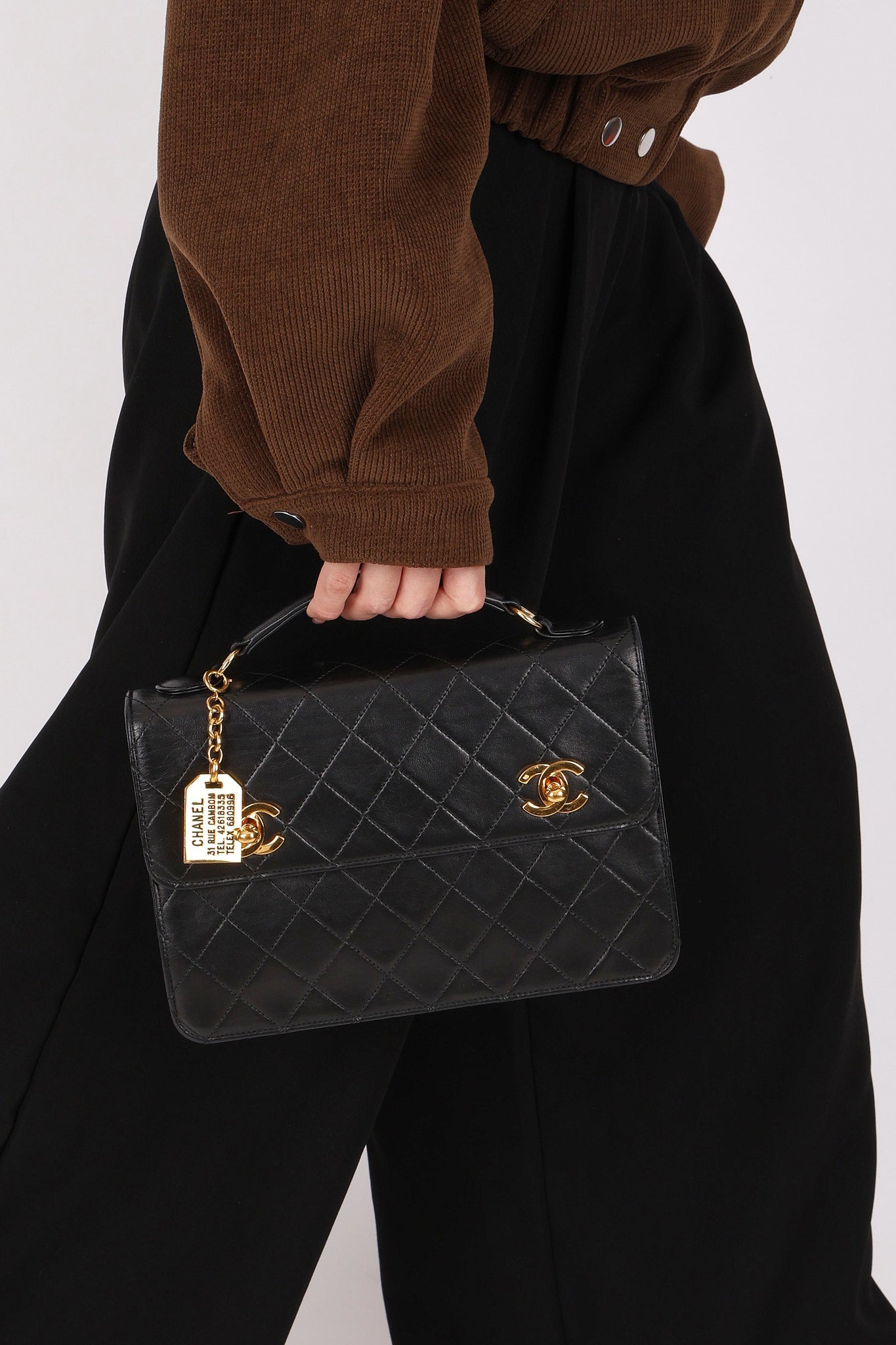 Chanel Double Turnlock Top Handle Bag Black Lambskin 24K GP
