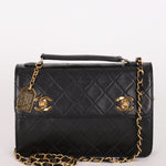 Chanel Double Turnlock Top Handle Bag Black Lambskin 24K GP