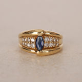 1980s - 1990s 18K Yellow Gold Marquise Cut Sapphire and Diamond Bypass Ring, Size US 7 - Drop 23