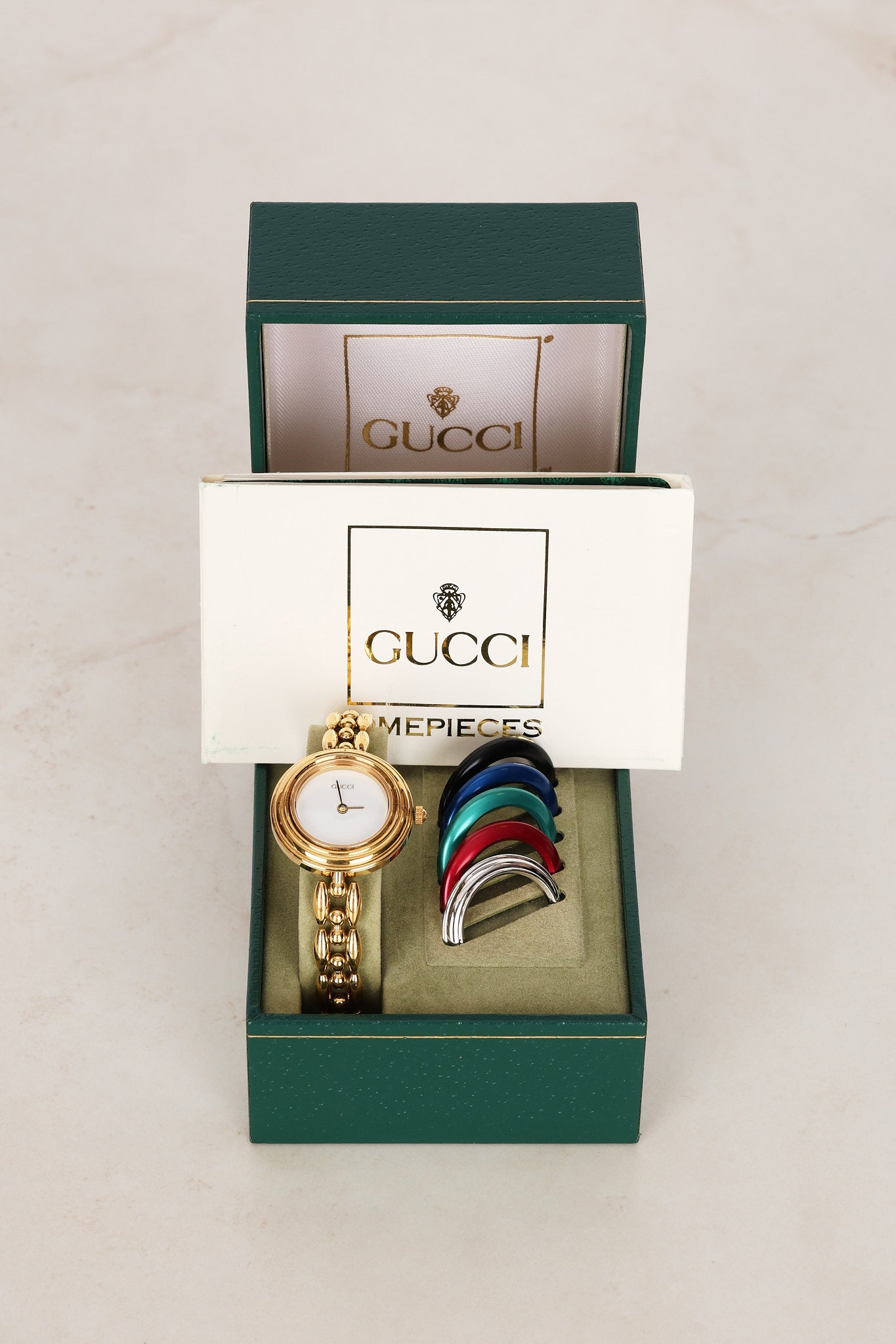 Gucci Multicolor Gold Bezel Watch