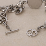 Gucci Stainless Steel Motif Engraved Face Charms Watch 22mm