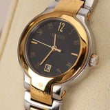 Gucci Oval Gold Watch