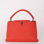 Louis Vuitton Taurillon Capucines MM Rubis