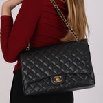 Chanel Maxi Classic Double Flap Black Caviar GHW