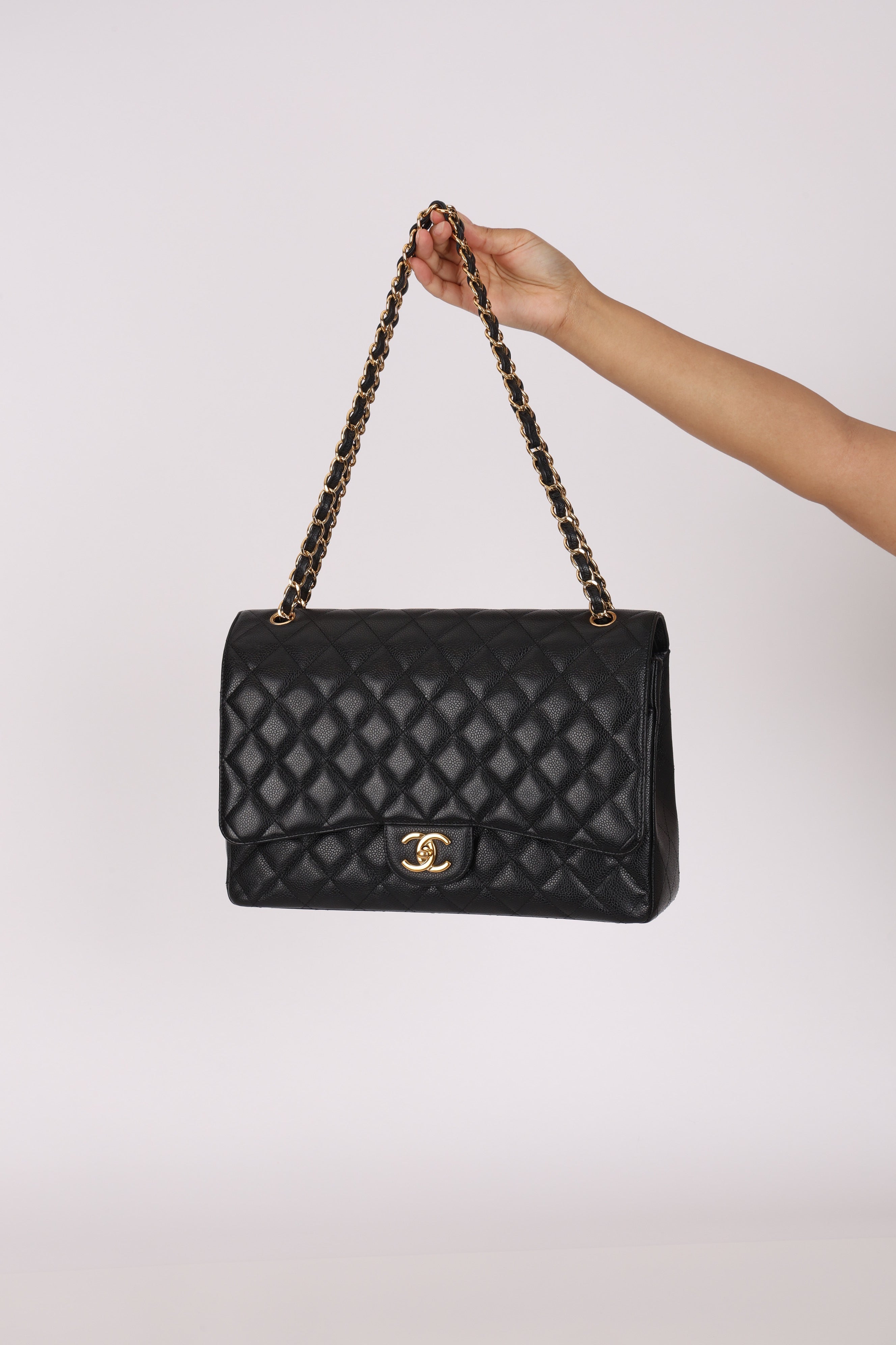 Chanel Maxi Classic Double Flap Black Caviar GHW