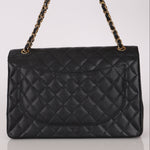 Chanel Maxi Classic Double Flap Black Caviar GHW