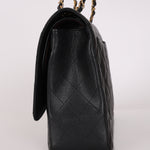 Chanel Maxi Classic Double Flap Black Caviar GHW