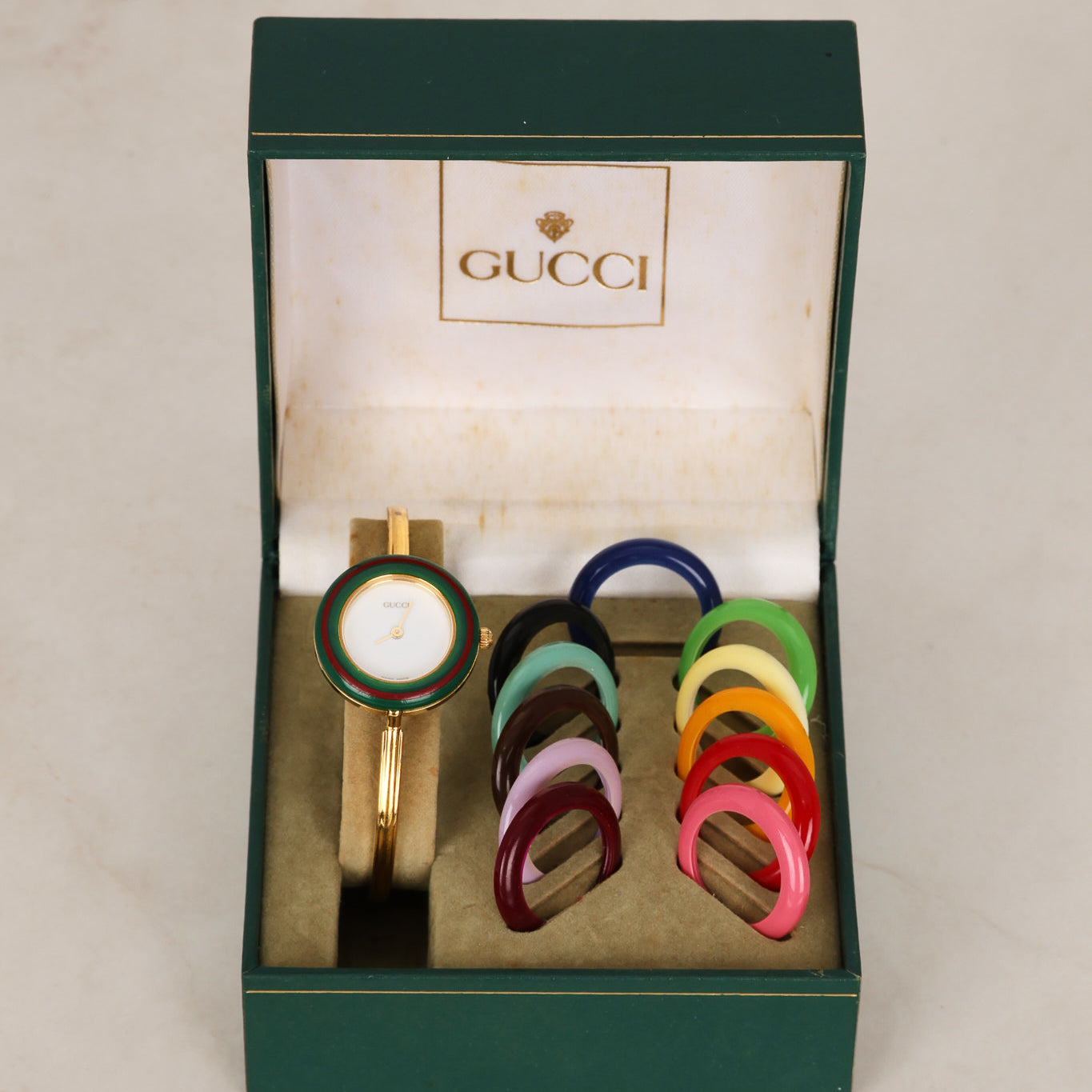 Gucci Multicolor Bezel Gold Watch