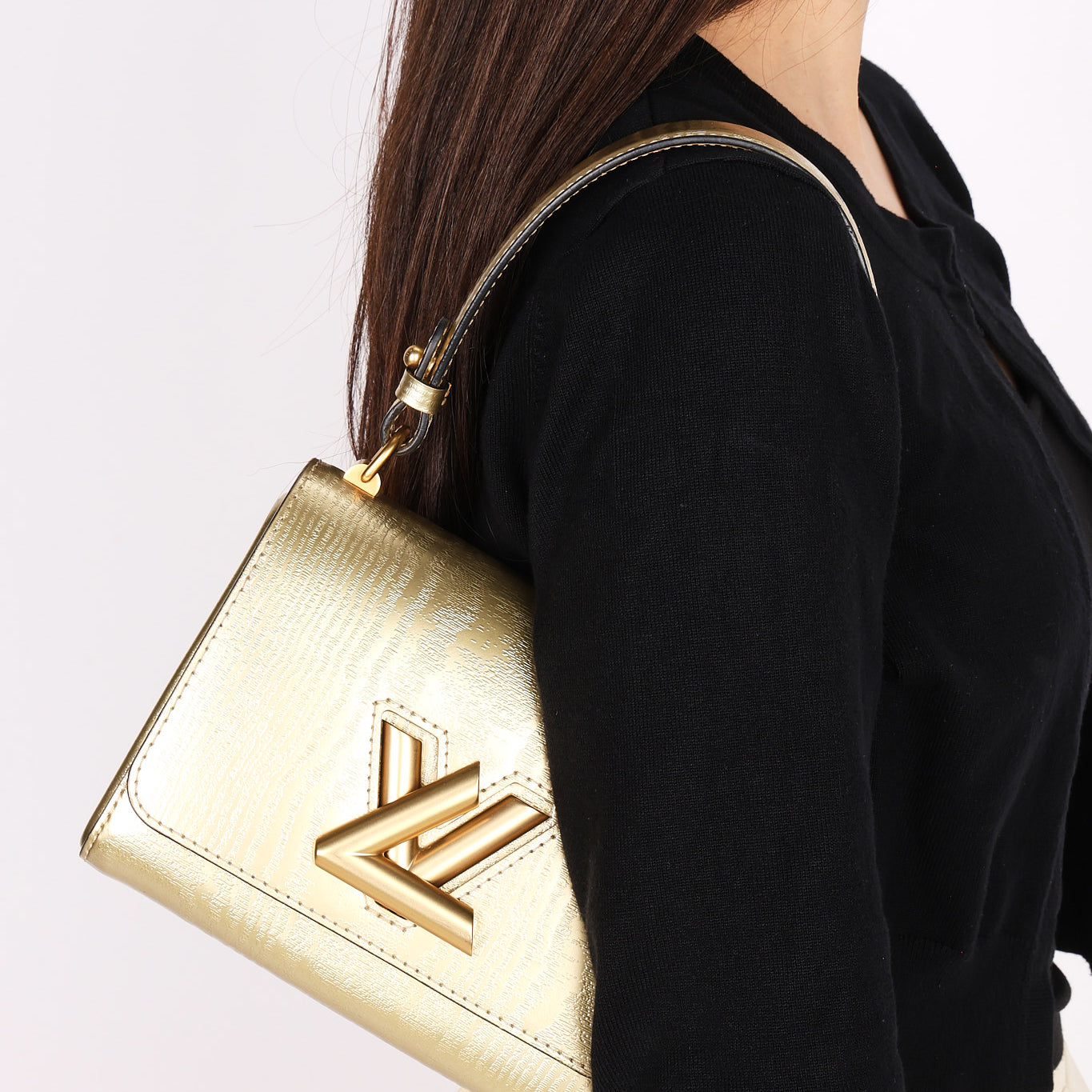 Louis Vuitton Gravity Twist PM Gold 2017